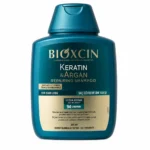 شامپو مو BIOXCIN مدل Keratin & Argan Repairing Shampoo حجم ۳۰۰ میلی‌لیتر